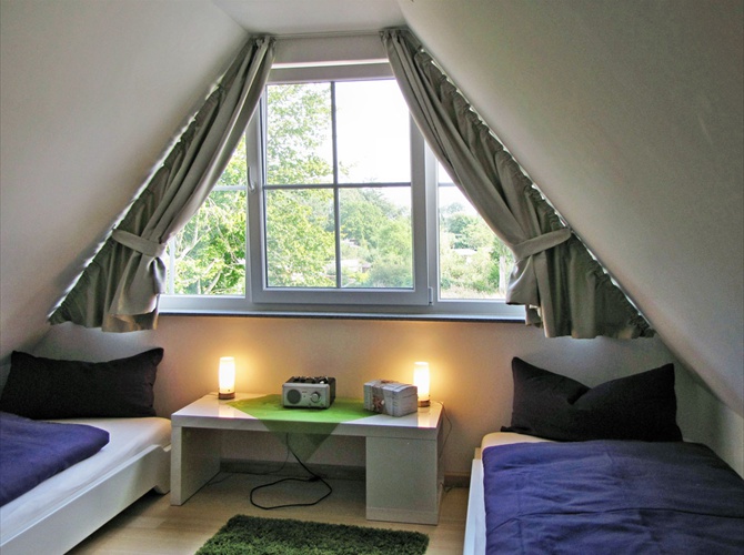 Das Schlafzimmer im ausgebauten Spitzboden