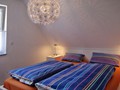 Ein Schlafzimmer im Dachgeschoss
