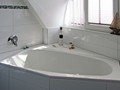 Eckbadewanne im Dachgeschoss